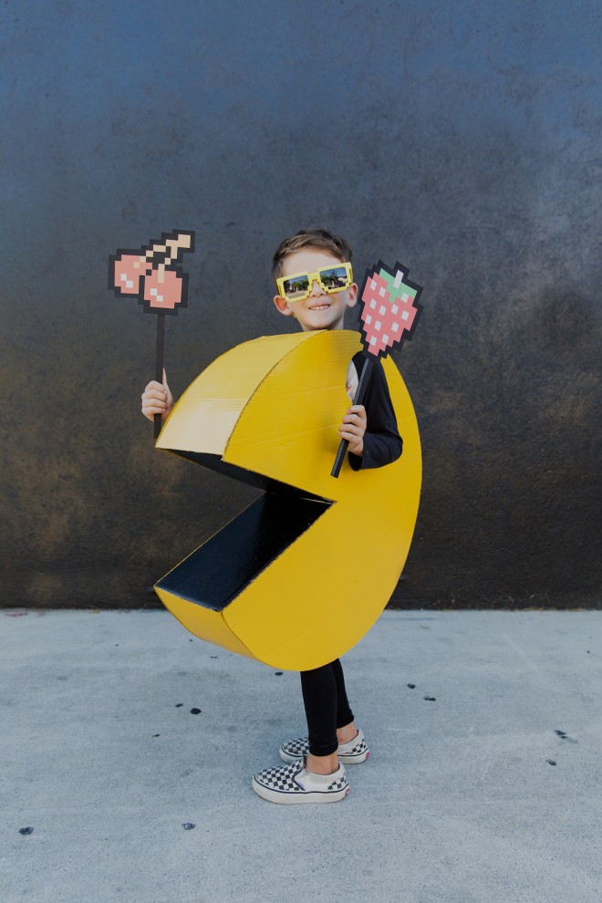 A boy in a PAC MAN Halloween costume