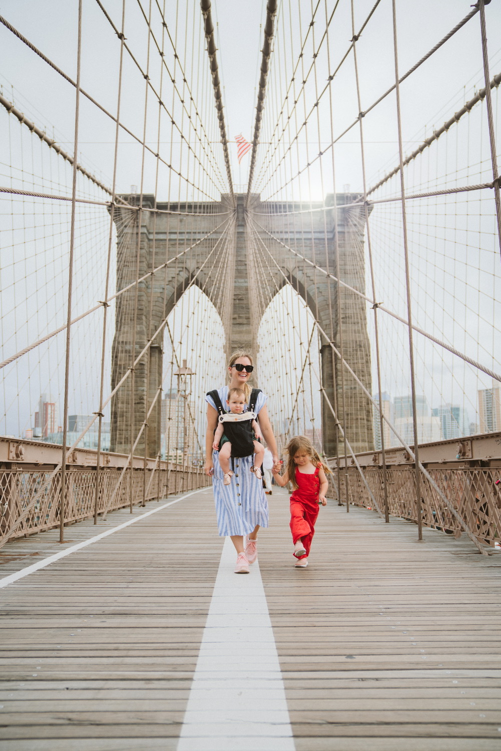 Walking across New York City bridge with kids