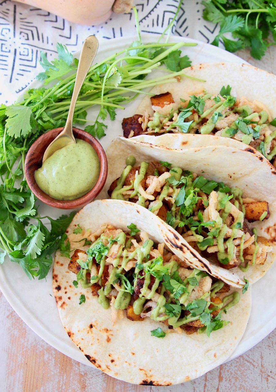 butternut squash tacos served on a white plate