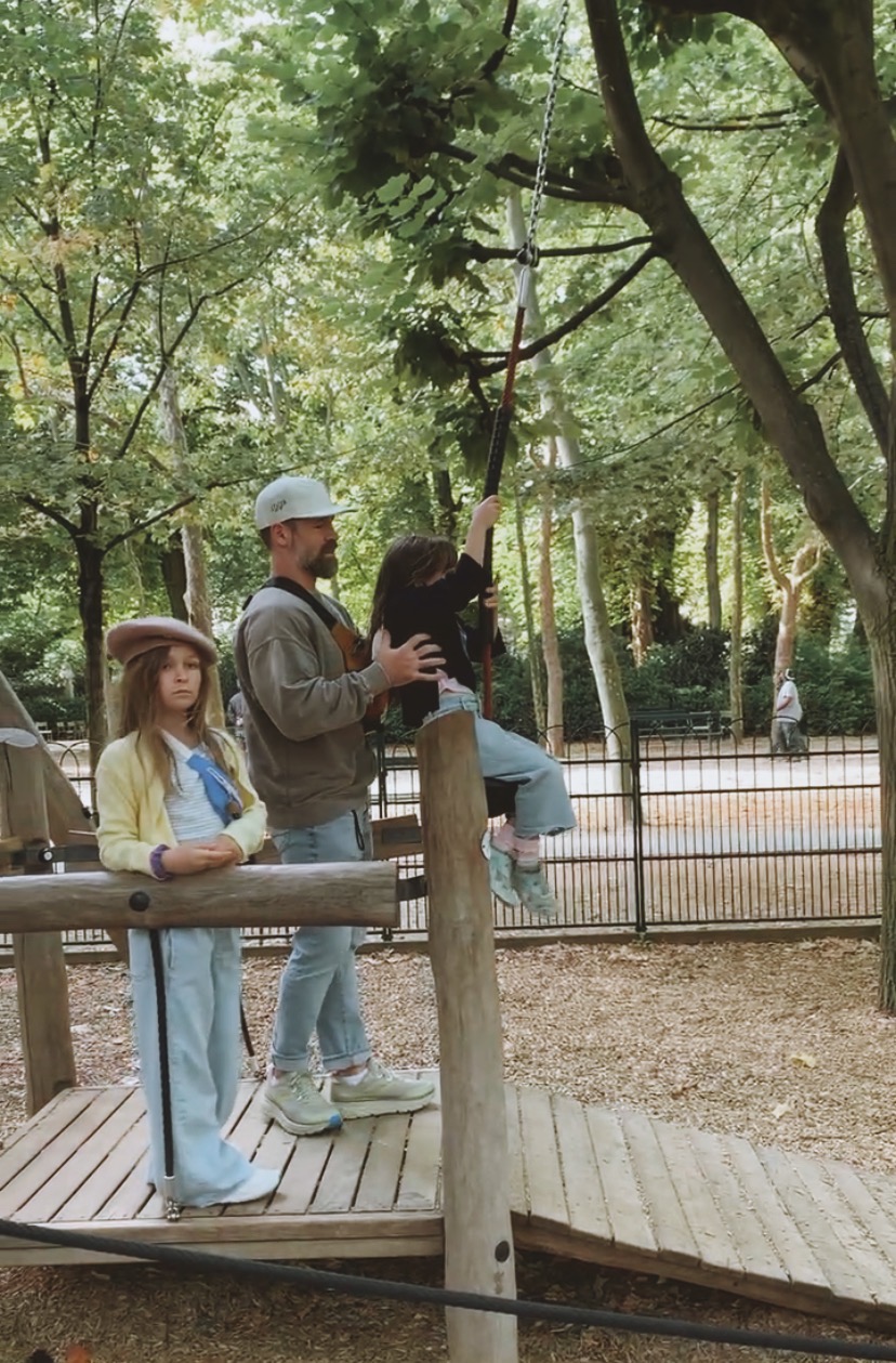 Children on the zipline at the Luxembourg Garden in Paris, France