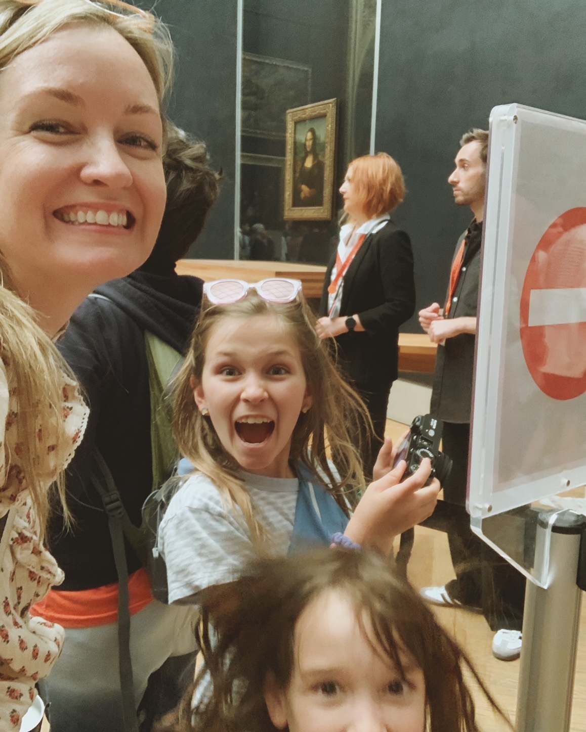 Selfie in front of the Mona Lisa at the Louvre in Paris