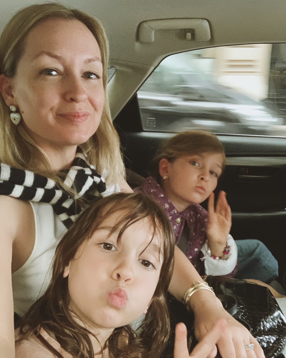 Mom and small daughters in paris